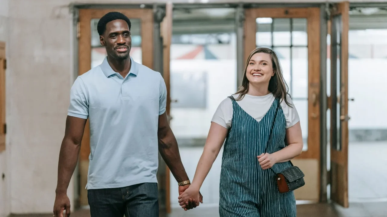 Couple Smiling Hand Holding